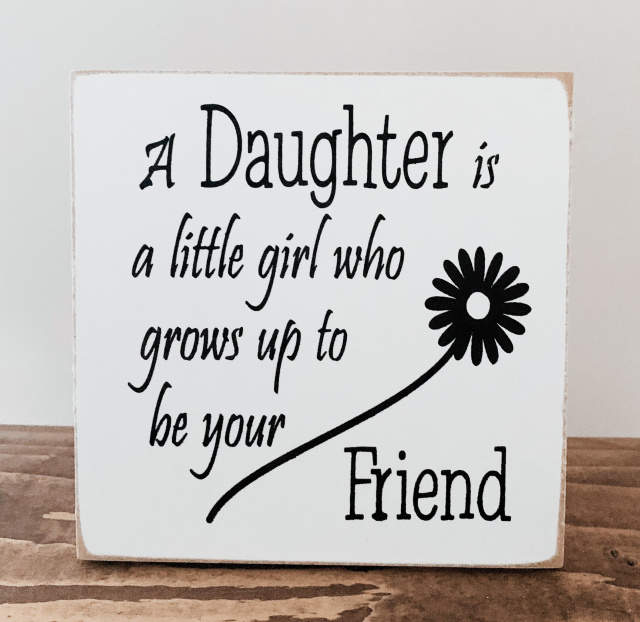"A Daughter is a little girl who grows up to be your Friend"